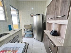 Guilhermina – apto pertinho da praia