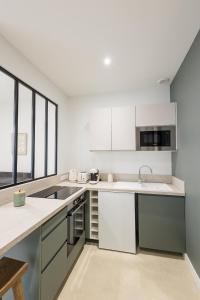 Appartements Esprit Nature d-eau Neuf et Chic : photos des chambres