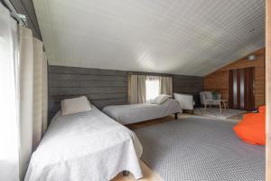 Villa Kultaranta B - Comfy Cabin Retreat in Tahko with Hot Tub & Sauna