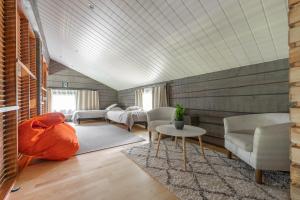 Villa Kultaranta B - Comfy Cabin Retreat in Tahko with Hot Tub & Sauna