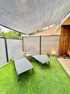 Appartements Garden & Grace- home cinema, petit dejeuner et parking : photos des chambres