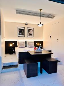 Appartements Garden & Grace- home cinema, petit dejeuner et parking : photos des chambres