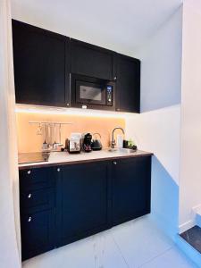 Appartements Garden & Grace- home cinema, petit dejeuner et parking : photos des chambres