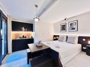Appartements Garden & Grace- home cinema, petit dejeuner et parking : photos des chambres