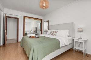 Elegant Flat with Pool & Balcony by HostWise