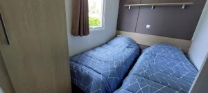 Villages vacances Mobil home 6 pers, 3ch, terrasse, lits faits : photos des chambres