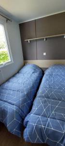 Villages vacances Mobil home 6 pers, 3ch, terrasse, lits faits : photos des chambres