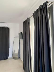 AiΘeria Suites Ios - Room Loza