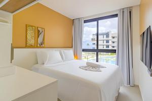 Pé na areia com restaurante exclusivo para hóspedes