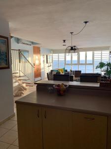 Beautiful Beach Front Penthouse w Rooftop Terrace