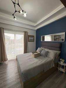 Amani 311 Suites - Double bed with Single Pull Out Bed