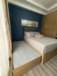 Amani 311 Suites - Double bed with Single Pull Out Bed