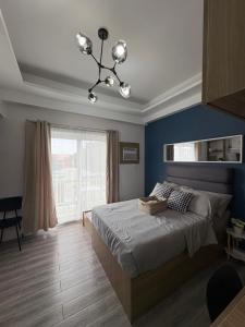 Amani 311 Suites - Double bed with Single Pull Out Bed