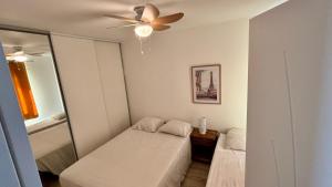 Maisons de vacances Lits faits, valise a poser, 3 mn Futuroscope : photos des chambres