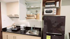 UNIT 305 New Brenthill Condo with balcony near SM BGO