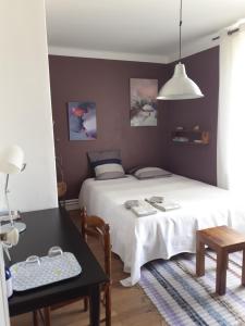 Sejours chez l'habitant Chambres Zola : Chambre Double - Vue sur Jardin