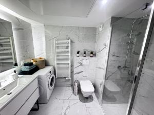 Appartements Luxueux appartement climatise avec piscine & parking : photos des chambres