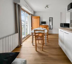 Appartement chaleureux, parking privé proche plage