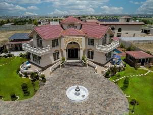 Luxury Hotel Near Islamabad Airport- BBQ, Pool, Waterfall, Gazebose