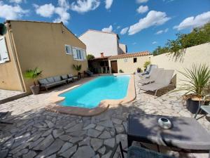 Maisons de vacances Maison calme avec piscine : photos des chambres