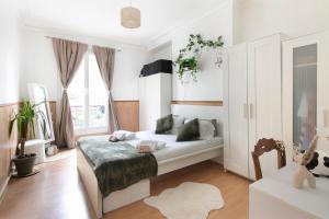 Appartements Bright & Charming Apartment in Paris 1BDR : photos des chambres