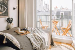 Astor - Studio et balcon à Batignolles