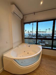 ALOHA BEACH ESTUDIO NUEVO JACUZZI FRENTE AL MAR
