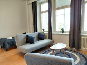 Kotimaailma Apartments - keskustakolmio - Rautatienkatu 14