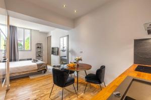 Appartements Studio Charming & Modern : photos des chambres