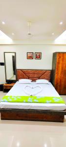 Manyavar Guest House Rooms & Family Service Flats - 3hvězdičkové hotely ve městě Deoghar