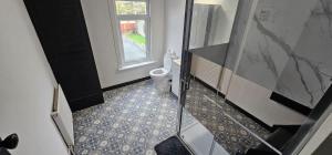 Refurbished 4-Bed Home Near Hospital & Station
