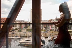 Granaria Premium River View by Downtown Apartments