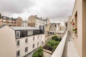 Appartements Orhy - 2 chambres et terrasse a Porte Dauphine : photos des chambres