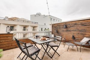 Appartements Orhy - 2 chambres et terrasse a Porte Dauphine : photos des chambres