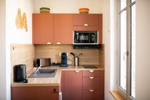 Appartements Studio Lucien - Villa Bon Accueil proche mer : photos des chambres