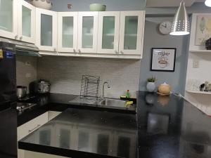 1 Bedroom unit with balcony and facing amenities and just beside SM Ecoland