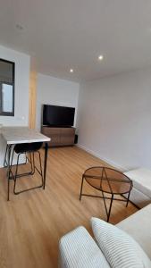 Appartements Appartement proche de la grande plage : photos des chambres