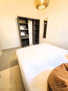 Appartements Charmant T3 : photos des chambres