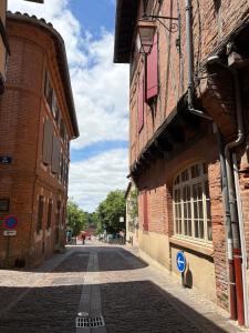Appartements Le Castelviel au pied de la Cathedrale : photos des chambres
