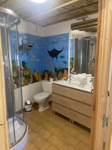 Appartements Studio Tahiti du Cloitre : photos des chambres