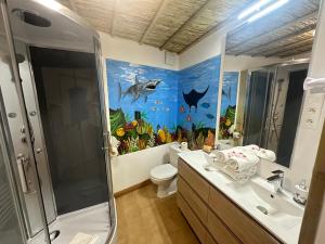 Appartements Studio Tahiti du Cloitre : photos des chambres