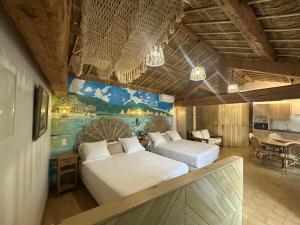 Appartements Studio Tahiti du Cloitre : photos des chambres