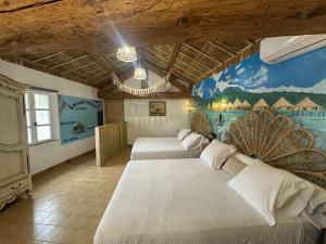 Appartements Studio Tahiti du Cloitre : photos des chambres