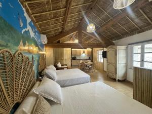 Appartements Studio Tahiti du Cloitre : photos des chambres