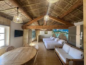 Appartements Studio Tahiti du Cloitre : photos des chambres