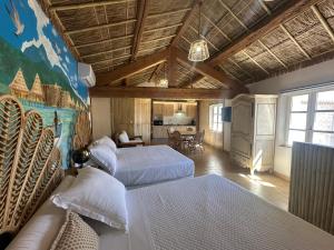 Appartements Studio Tahiti du Cloitre : photos des chambres