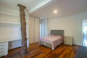 Refúgio da ilha: 6 suítes, piscina e churrasqueira