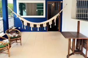 Acolhedora Casa condominio 500m da praia