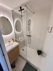 Appartements Studio Exotique Hyper-Centre Enghien 12min Paris : photos des chambres