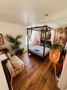 Appartements Studio Exotique Hyper-Centre Enghien 12min Paris : photos des chambres